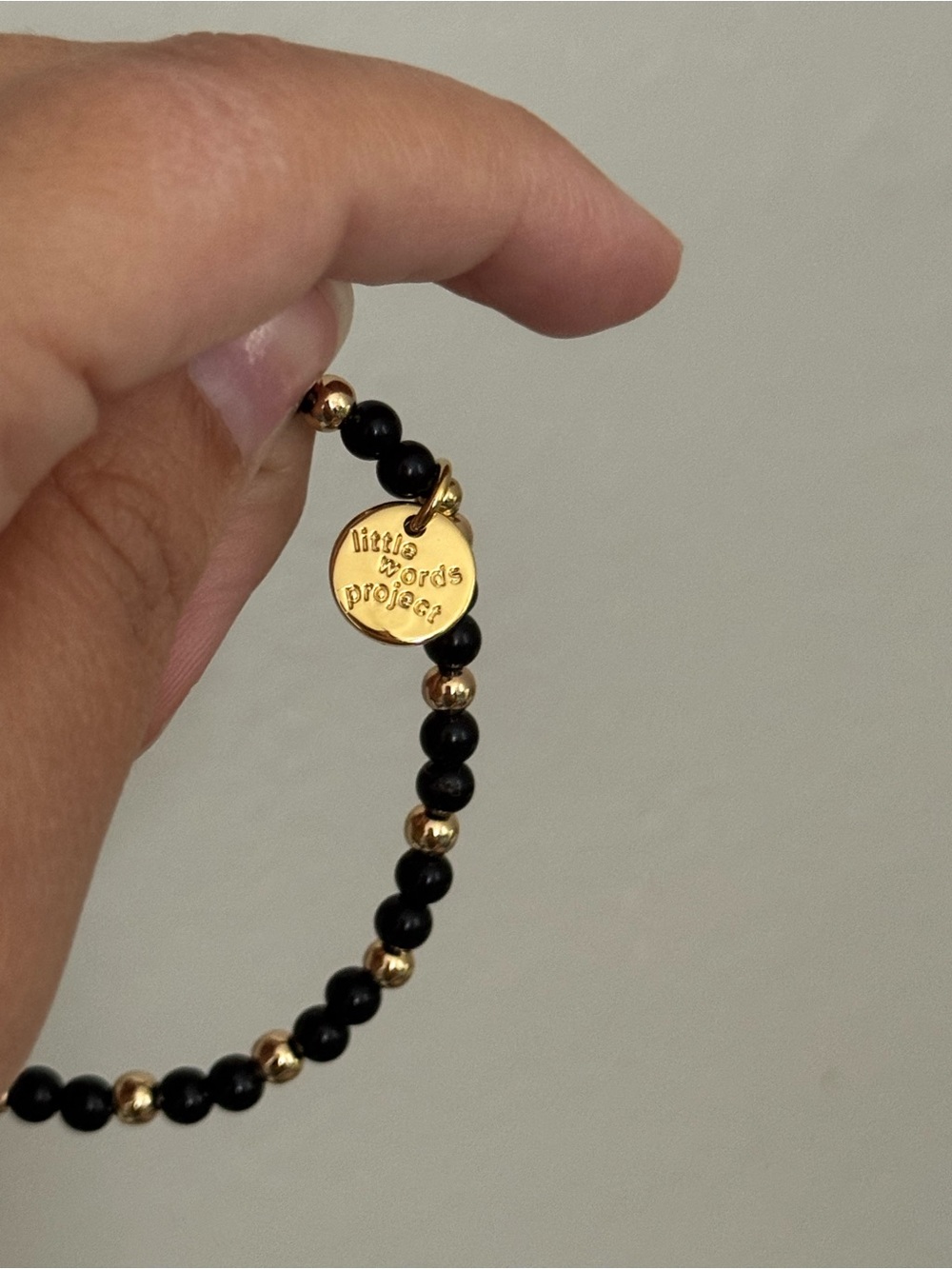Little Words Project x Maybelline Worth It Black & Gold Beaded Stretch Bracelet - Picture 3 of 3